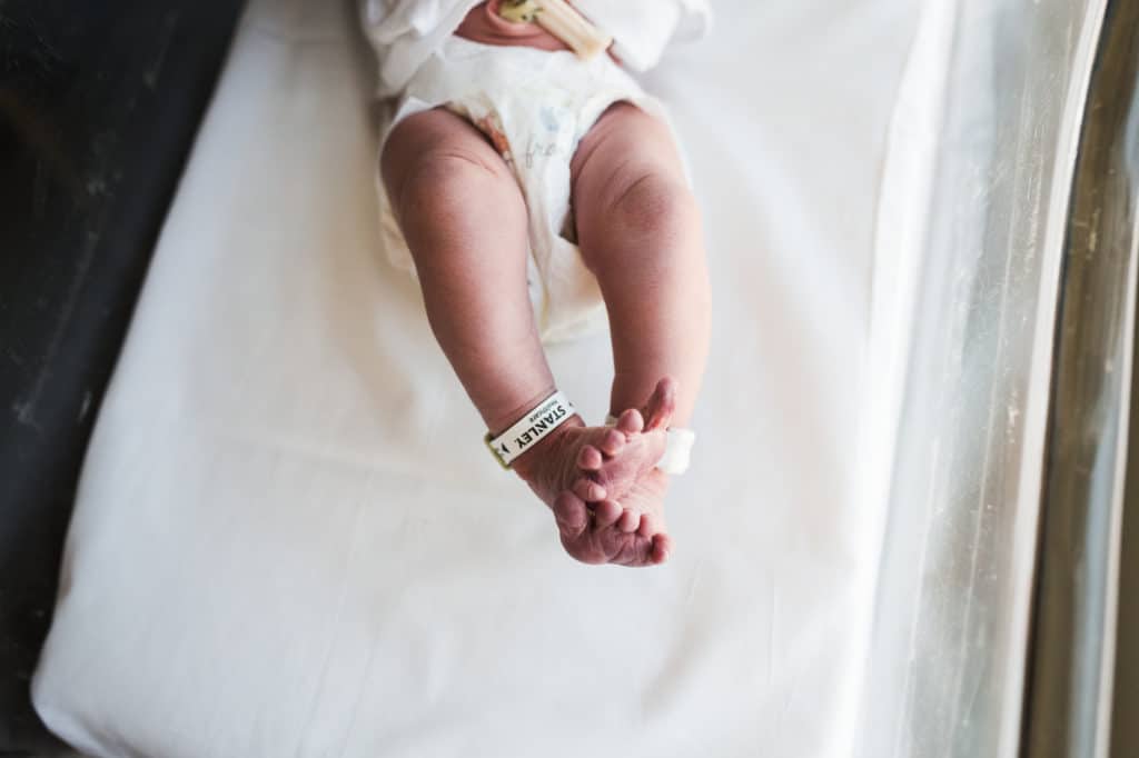 Newborn in Hospital Bassinet