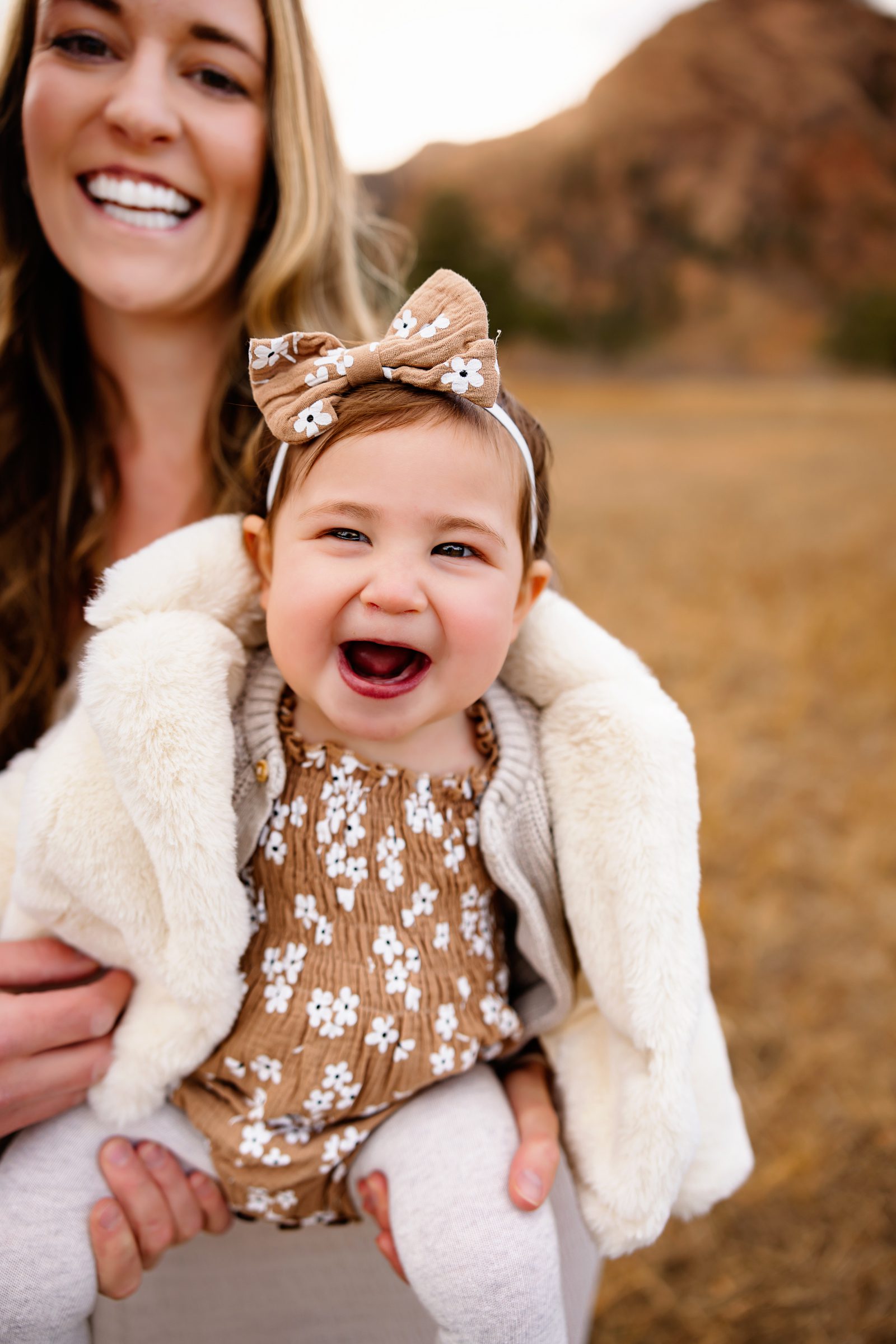 A mother and daughter share a tender embrace, radiating warmth and joy