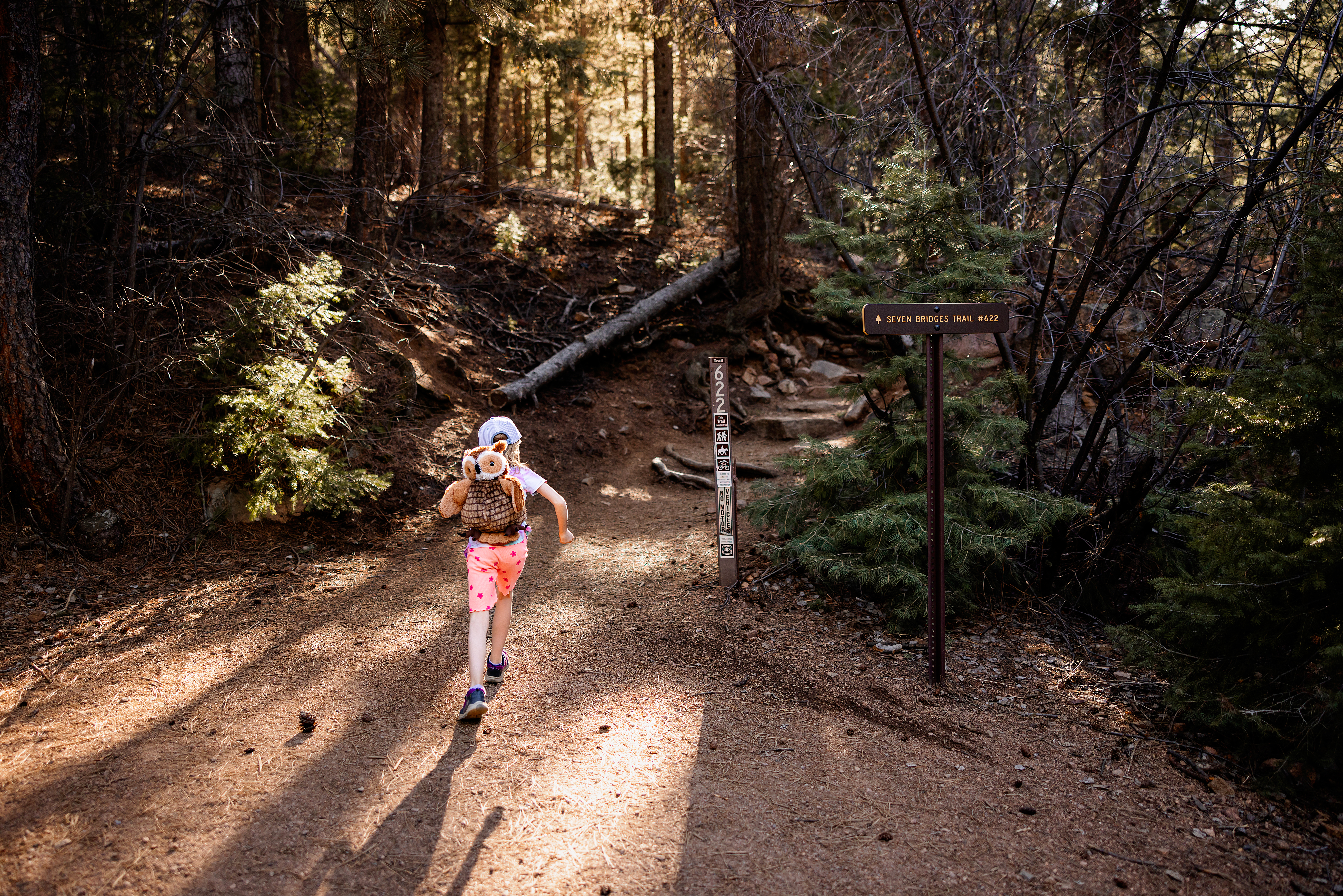 Child approaching the start of Seven Bridges Trail, a scenic family friendly hike in Colorado Springs