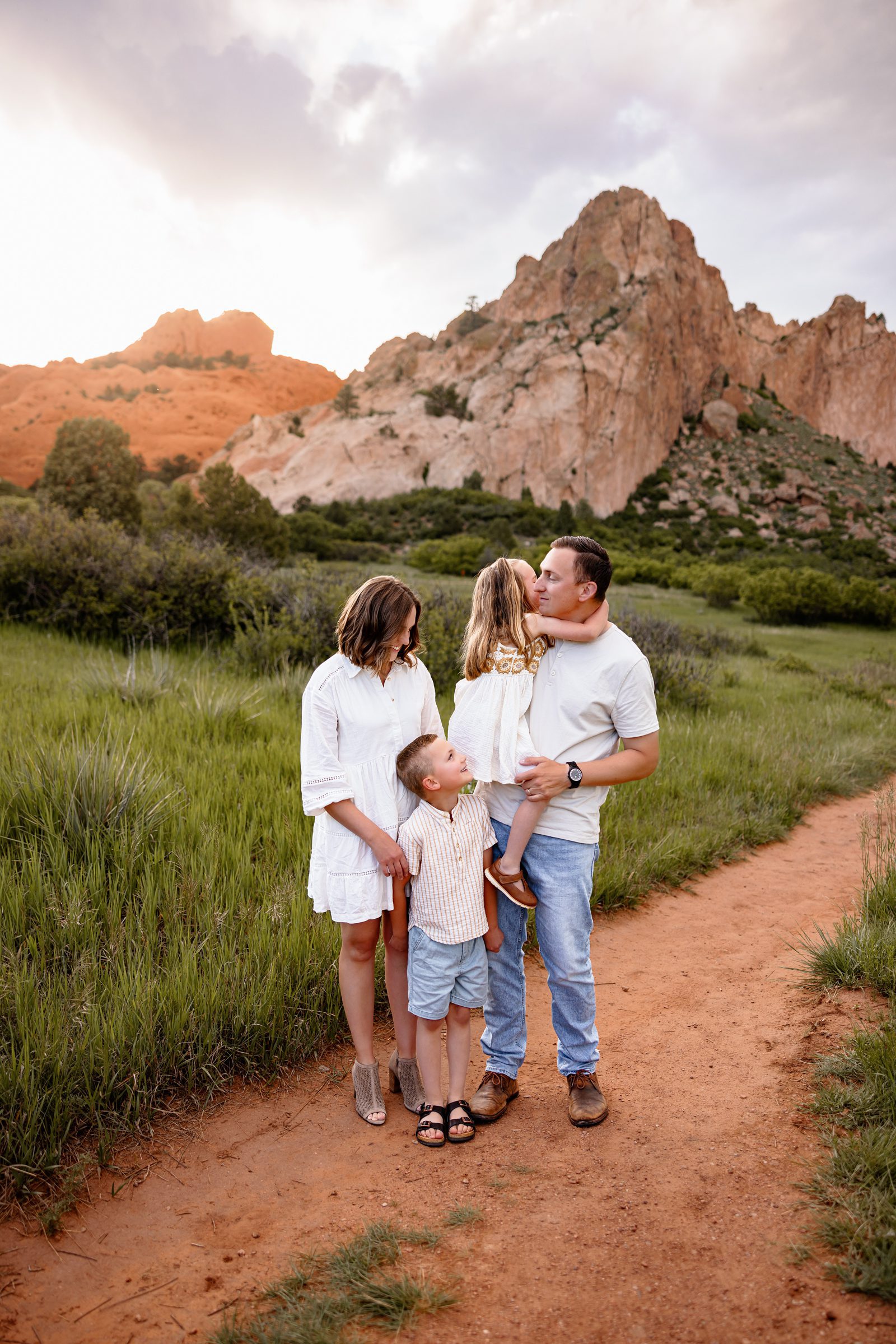 A family portrait taken at sunset at Garden of the Gods by a Colorado Springs Photograher