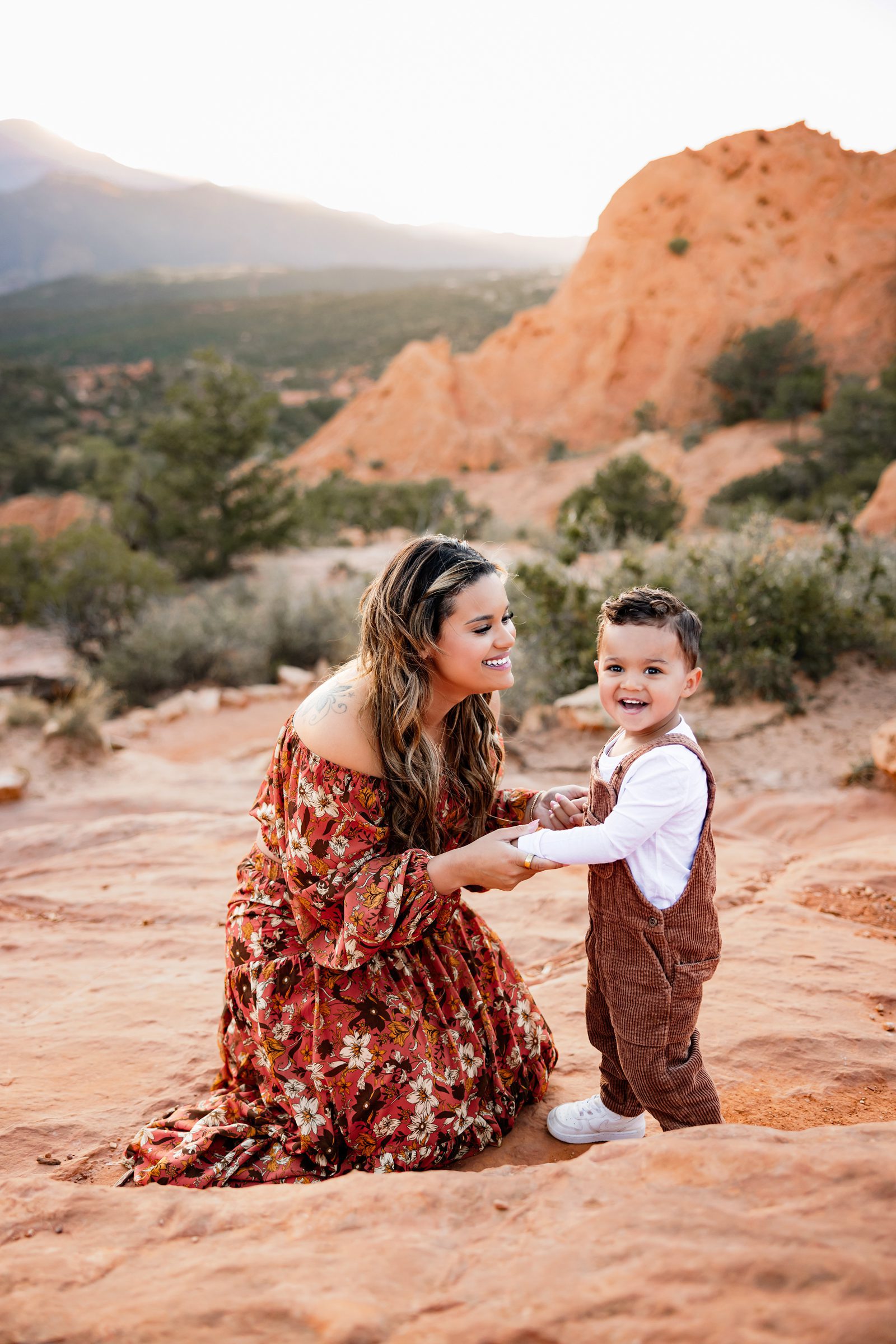 Garden of the Gods Mini Session sweet moment between mom and toddler
