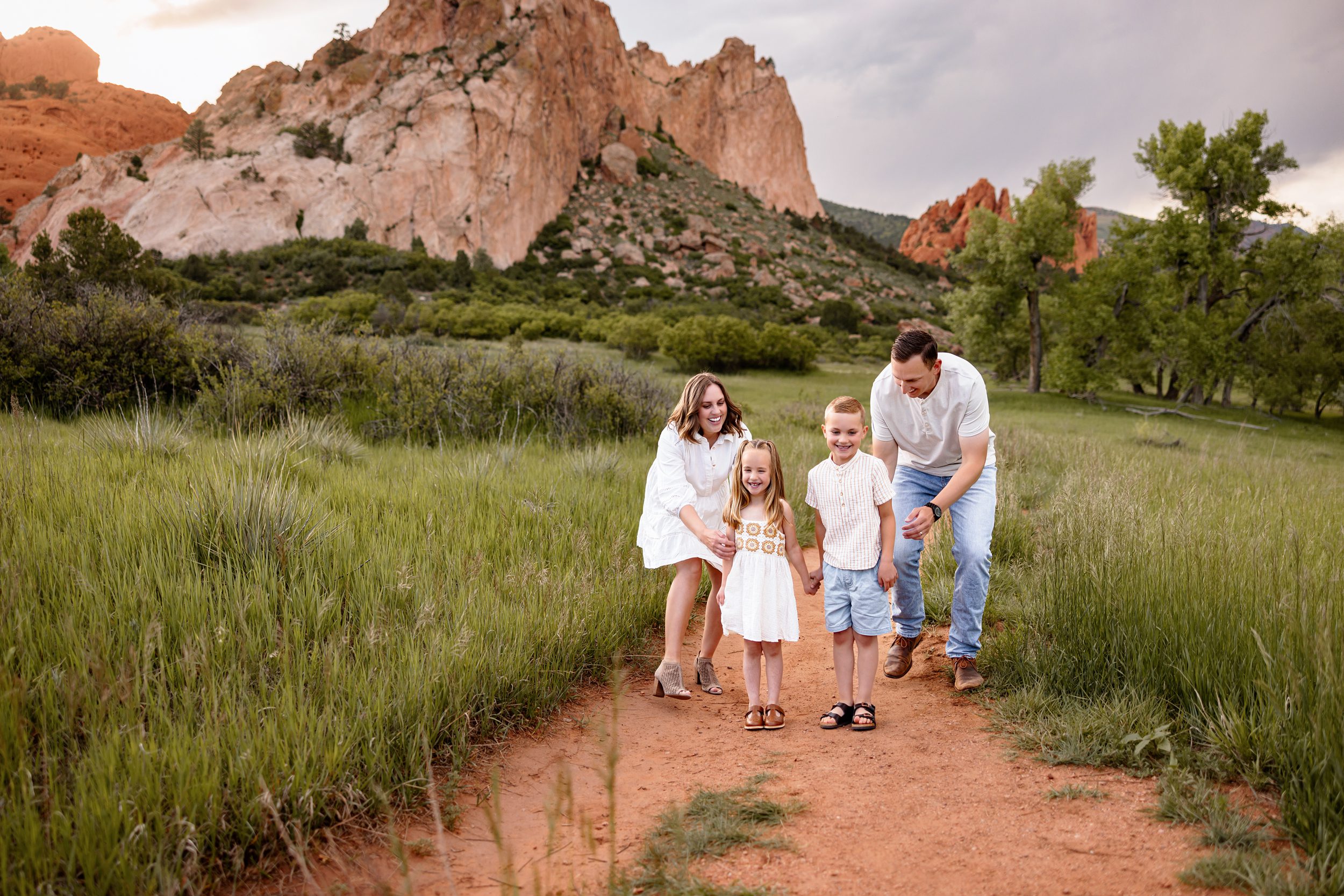 A playful moment during a family photo session in Colorado Springs